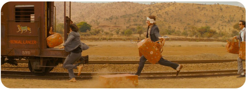 Pogoń za pociągiem jest jedną z bardziej rozpoznawalnych scen z repertuaru Wesa Andersona. - Scroll